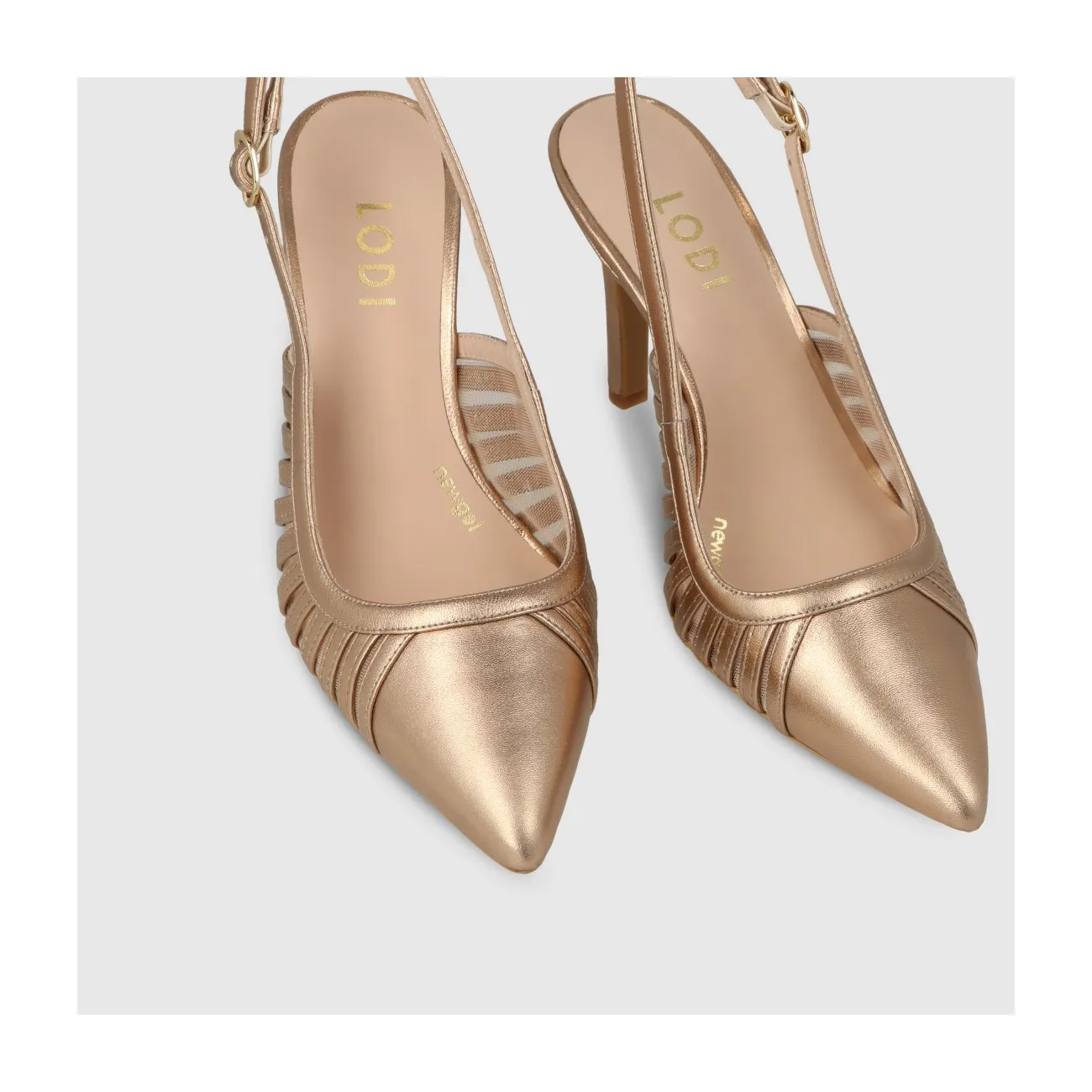 Escarpin slingback pour femme en cuir métallisé couleur or antique et brides latérales. I LODI Chaussures pour femme online.