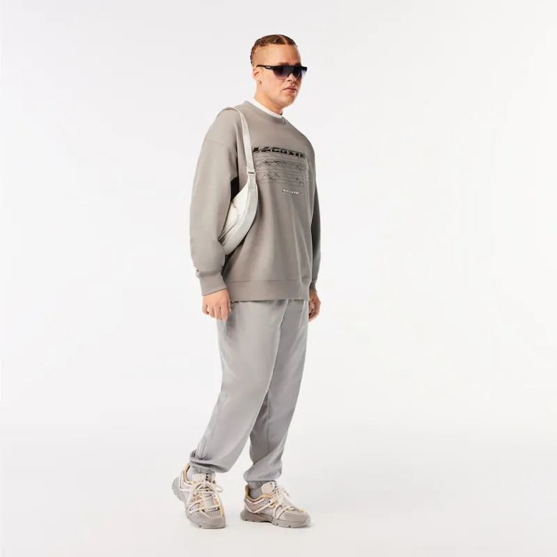 SWEATSHIRT LACOSTE LOOSE FIT GRIS AVEC MARQUAGES SUR LE DEVANT